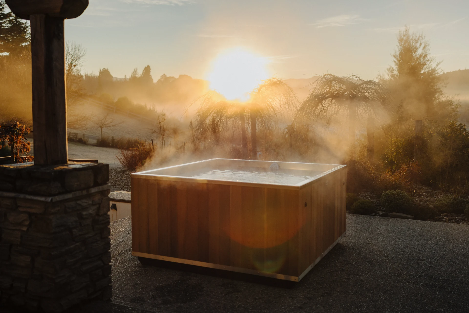 A handcrafted Stoked tub at sunrise in New Zealand